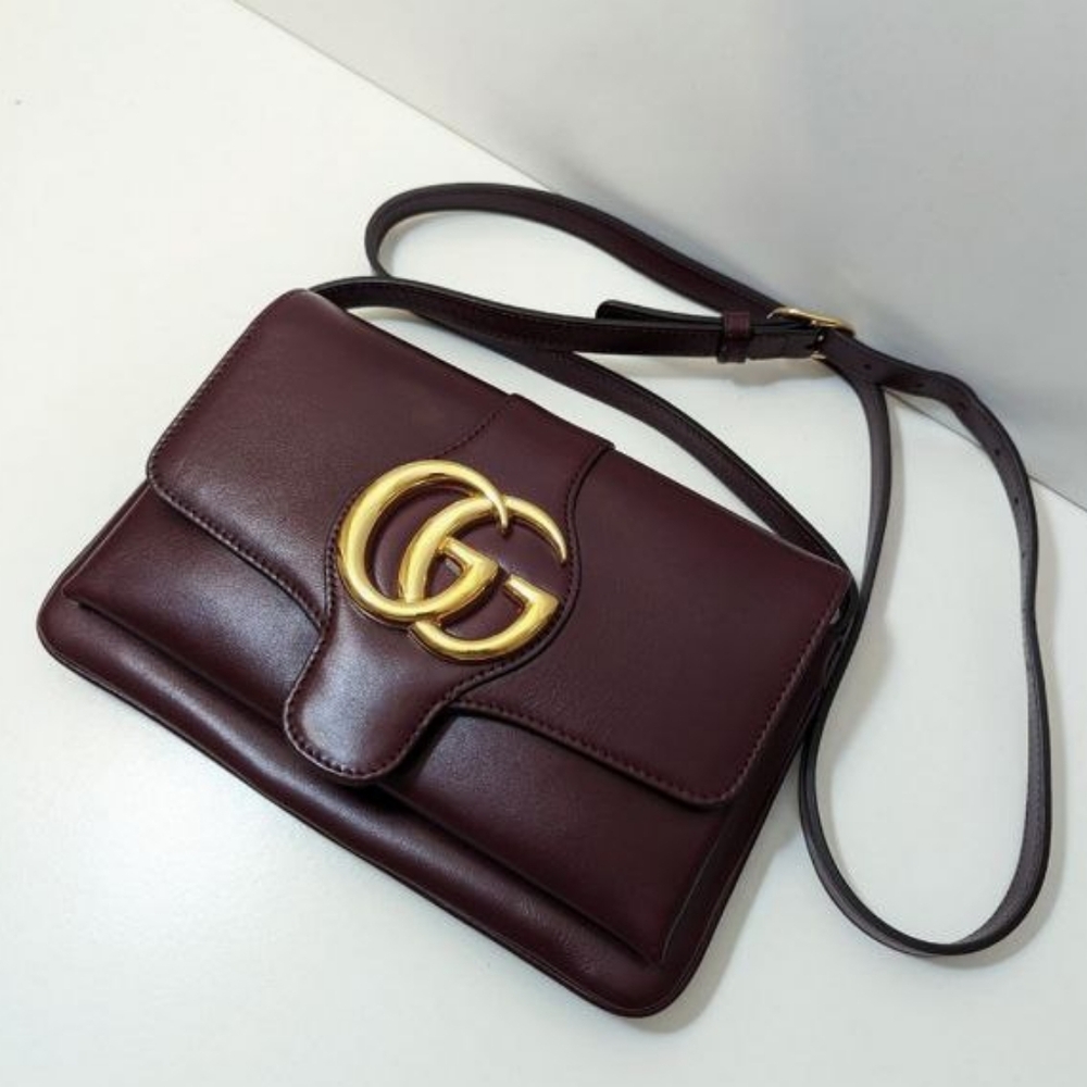 Gucci Crossbody Bag with Gold Accent